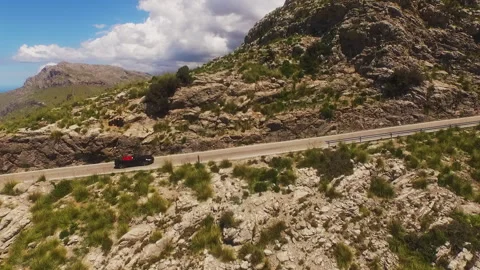 Convertible Climbing Mountain Road in Mallorca Stock Footage 327339800