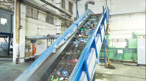 Conveyer. Plastic recycling. Time lapse. 4K+ Stock Footage 63221542