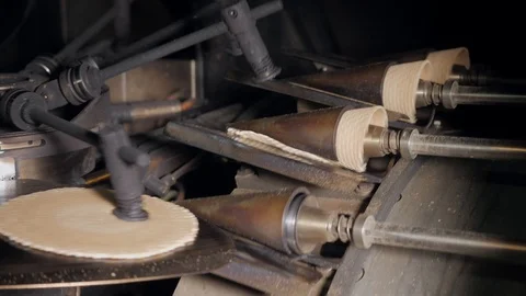 The conveyor automatic lines for the production of ice cream cones. Wafer cups Stock Footage 94156230