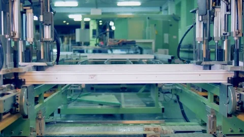 Conveyor Belt assembling plastic details. Automated machine on a factory Video stock 83384844