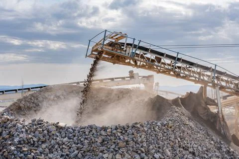 Conveyor belt for classifying the different types of sand and gravel Stock Photos
