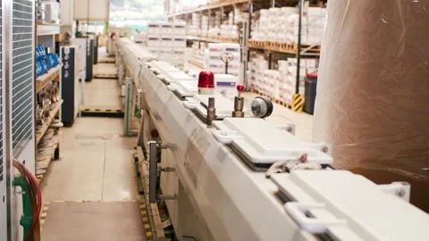Conveyor Belt Passing Wrapped Roll, Industrial Warehouse Interior Video stock 342279024