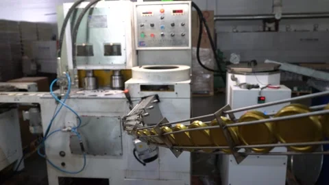 A conveyor belt system that efficiently moves products within a factory. The Stock Footage 332227621