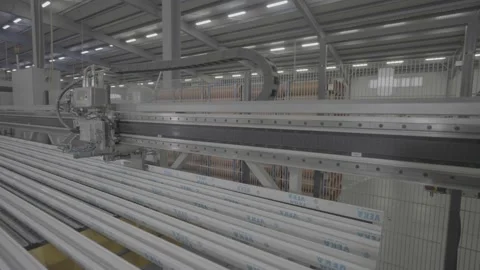 Conveyor belt for transporting PVC Window and Door profiles 4k Stock Footage 219466032