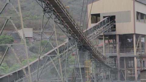 Conveyor Belts transporting gold ore in a Gold Extraction Stock Footage 230026643