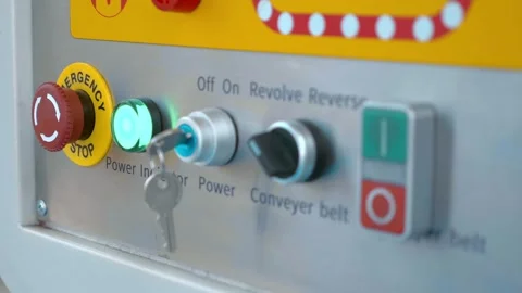 Conveyor control panel has buttons, a key for turn on and emergency stop button Video stock 333326548