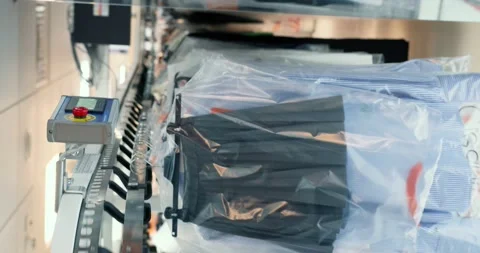 Conveyor in dry-cleaning salon in process of work Video stock 153538626