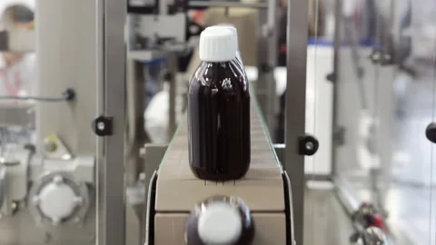 Conveyor for labeling in action. Stock Footage 246880767