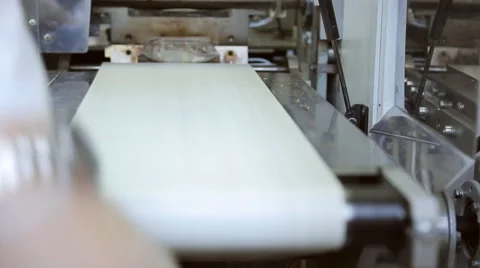 Conveyor line for packaging of cold snack for food on board plane Video stock 64995950