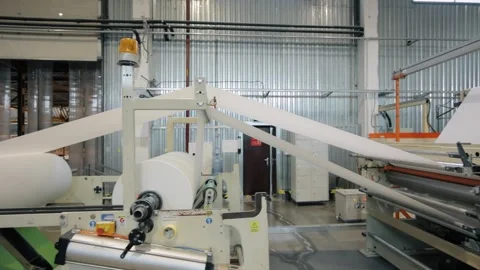 Conveyor line at paper mill. Modern toilet paper production. Production of Stock Footage 308717604