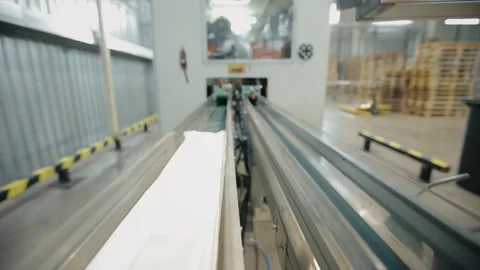 Conveyor line at paper mill. Modern production of napkins Stock Footage 308717703