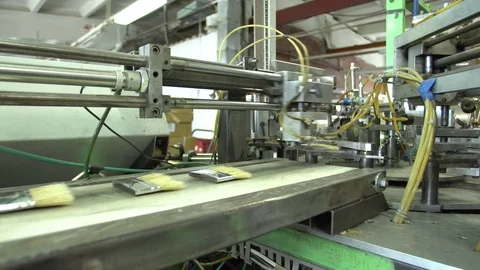 Conveyor line for the production of brushes in a small factory 4k. Stock Footage 77824322