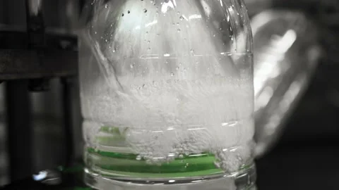 Conveyor line for the production of drinking spring water into plastic bottles Stock Footage 161821311