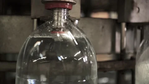 Conveyor line for the production of drinking spring water into plastic bottles Stock Footage 161825067