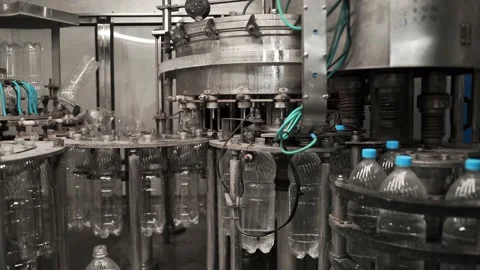Conveyor line for the production of drinking spring water into plastic bottles Stock Footage 161826460