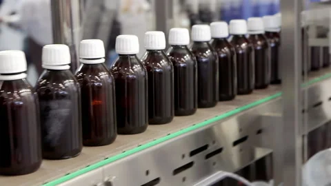 Conveyor line for the production of pharmaceuticals. Stock Footage 197408366