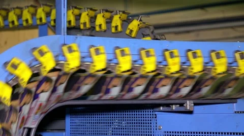 Conveyor with newspapers Stock Footage 64258704