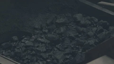 Conveyor with ore shooting in Close-up there is ore on belt conveyor 4K Stock Footage 219536905