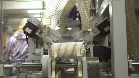 Conveyor production of paint rollers in a small factory close-up 4k. Stock Footage 77825397
