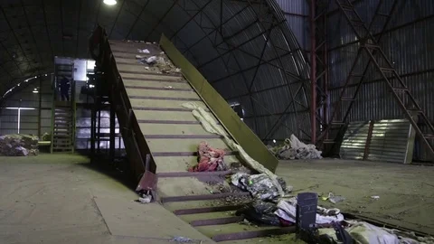 Conveyor raises garbage Stock Footage 82054191