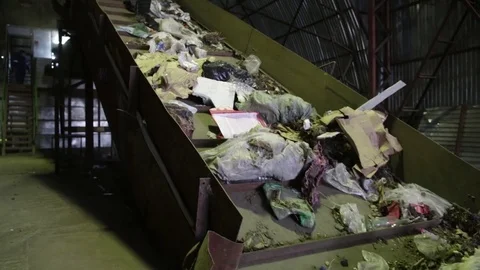 Conveyor raises garbage Stock Footage 82054192
