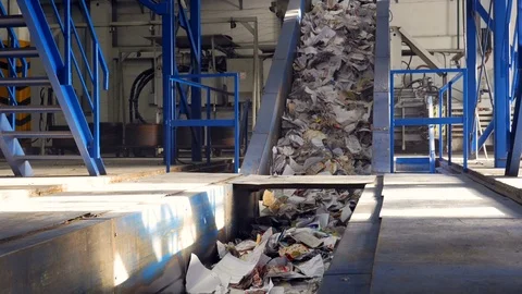 Conveyor for sorting garbage. Paper on the sorting conveyor. Waste sorting Video stock 72708673
