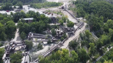 Conveyor system on the slope of a mining facility from above. Stock Footage 218444813
