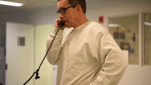 Convicted murderer Jens Soering making phone call prior to release to Germany 库存影片 122374070