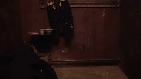 Convicted soviet officer is serving a sentence in a prison cell Stock Footage 81287561