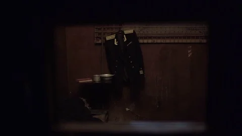 Convicted soviet officer is serving a sentence in a prison cell Video stock 82739555