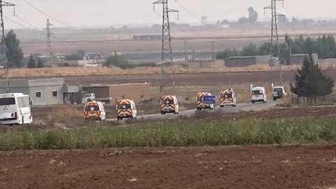 A Convoy of Ambulances co Stock Footage 120925155