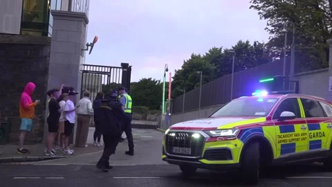 Convoy believed to be carrying Daniel Kinahan leaves Dublin’s Special Criminal  Video stock 341829317