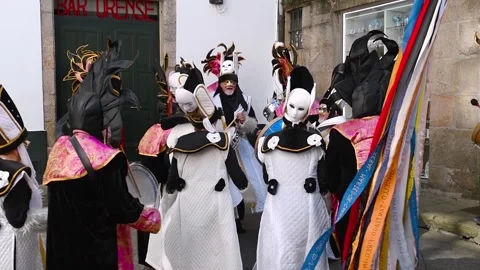 Conxo dancers and musicians performing traditional dance at carnival Video stock 311864458