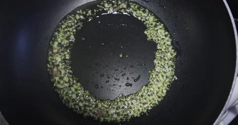 Coocking onion in pan Video stock 136134135