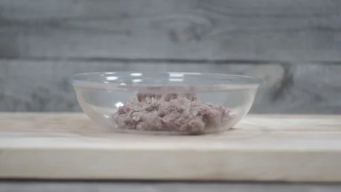 Cook adds salt to ground beef Stock Footage 106631274