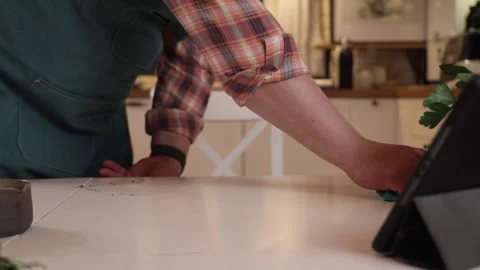 The cook in the background wiping down the table Stock Footage 275188017