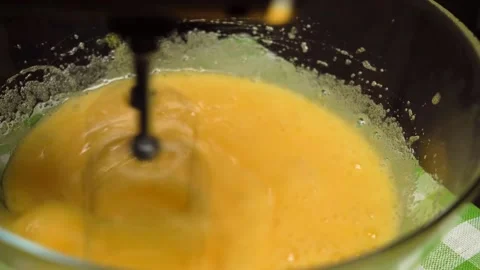 The cook beats eggs with sugar Stock Footage 156693323
