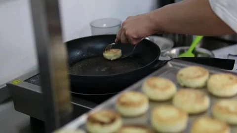 Cook buns form pancakes baking dough gloves in flour curd baking Video stock 287999898