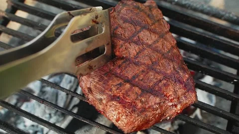 Cook checks steak slice stage 스톡 동영상 159328665