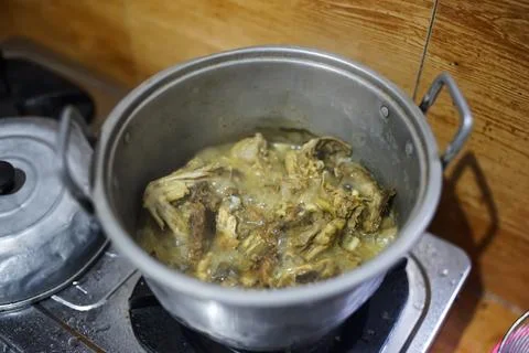 Cook chicken by boiling Stock Photos
