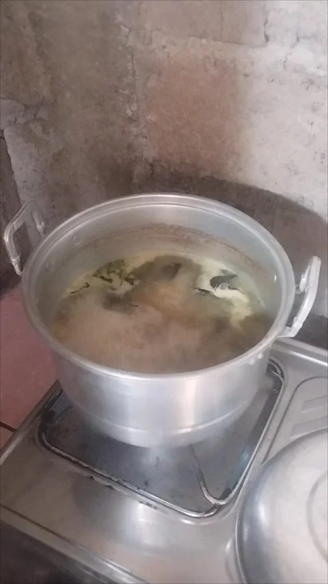 Cook the chicken drop soup in a small saucepan Stock Footage 291210479