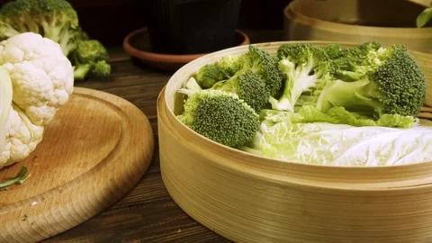 Cook chief preparing vegetables for steaming. Asian cuisine Stock Footage 83488590