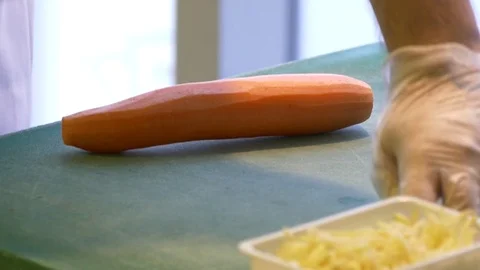 Cook chopped carrots Stock-Footage 72566329