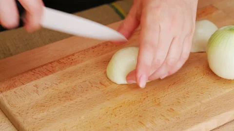 Cook chopping onions - closeup Stock Footage 56347010