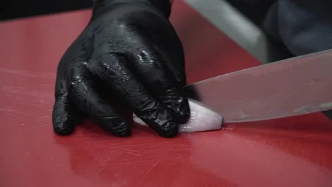 The cook chops the onion 스톡 동영상 130520529