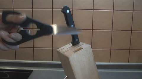 Cook chose scissors Stock Footage 46396213