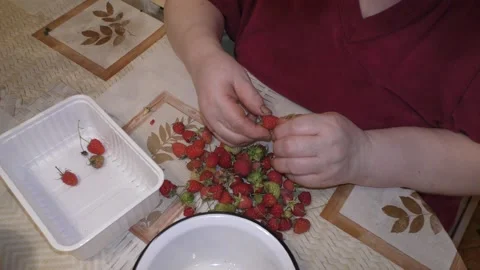The cook cleans the berry raspberry. healthy food concept Stock Footage 140396707