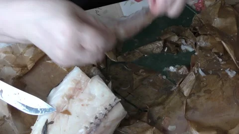 The cook cleans the cod fish Stock Footage 171276641