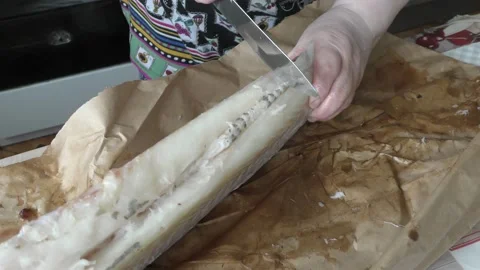 The cook cleans the cod fish Stock Footage 171278584