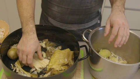 The cook cleans the cod Stock Footage 145647535